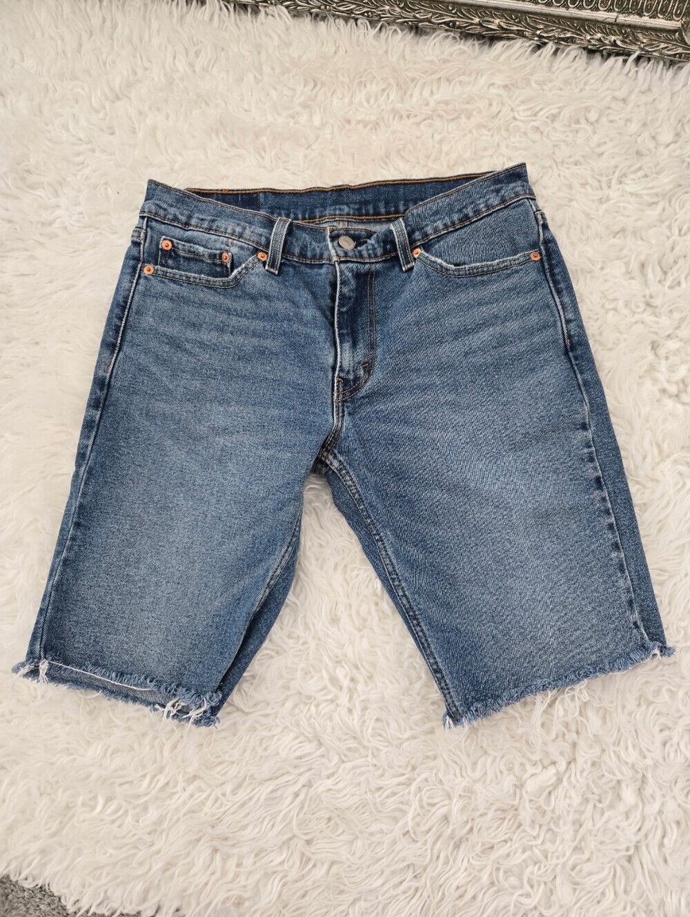 Levi's 511 Cut-Off Denim Shorts size 30. Good preowned condition.